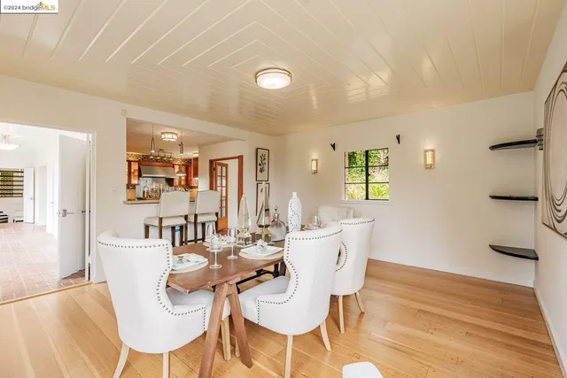 a living room with furniture fireplace and flat screen tv