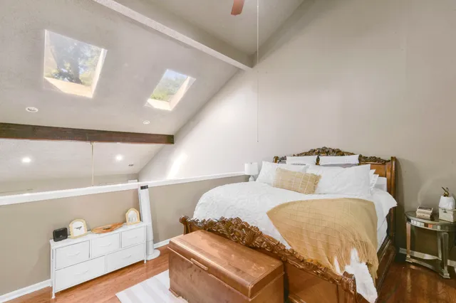 a view of a swimming pool with an outdoor seating