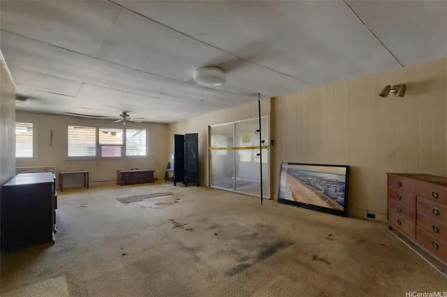 a view of livingroom with furniture and windows