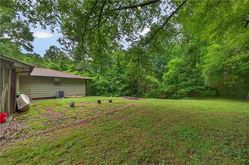 4399 Highway 411 Rydal, GA 30171 - Photo 27 of 37 a house view with a backyard space