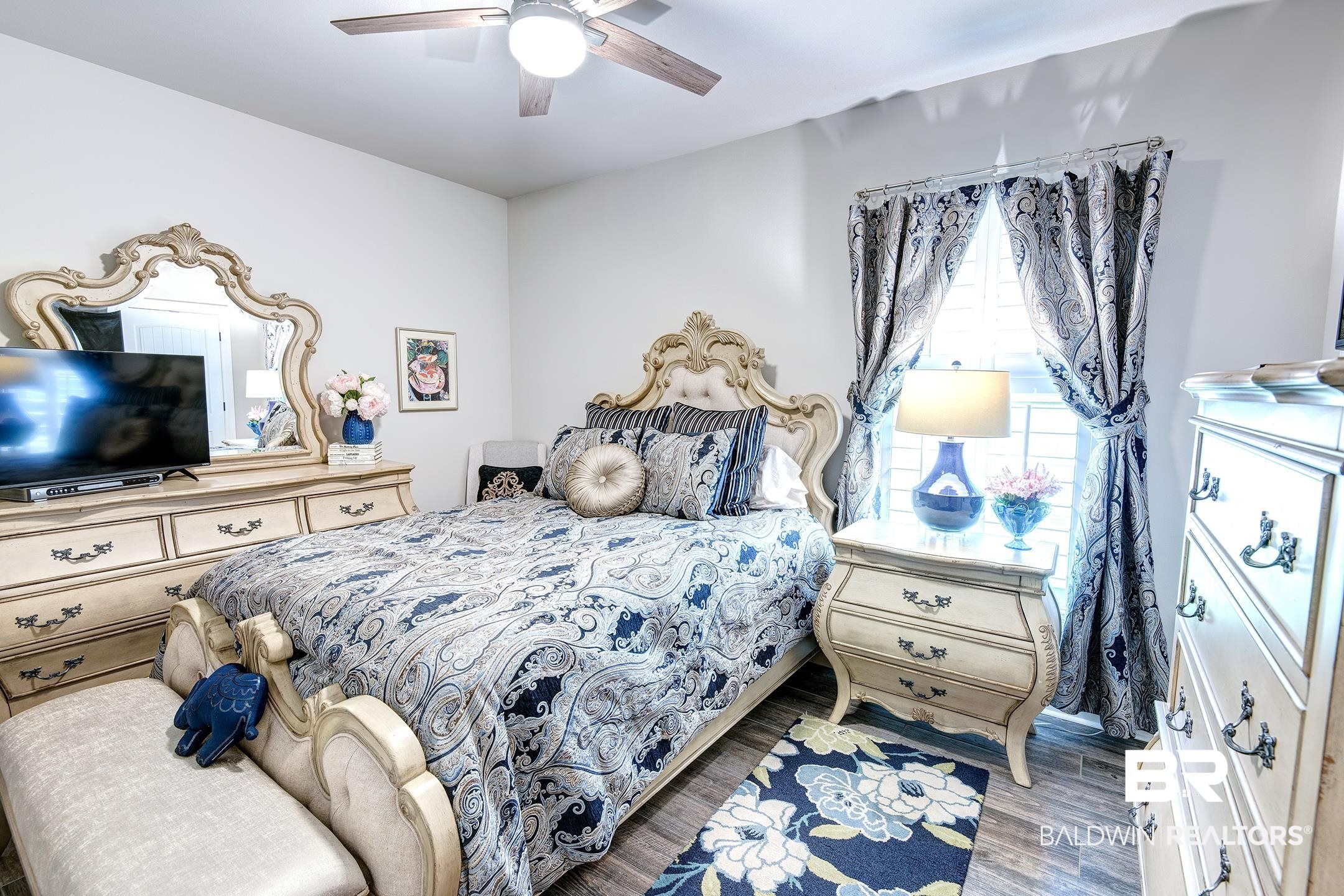 9988 Dunleith Loop Daphne, AL 36526 - Photo 46 of 51 Bedroom with ceiling fan and hardwood / wood-style flooring