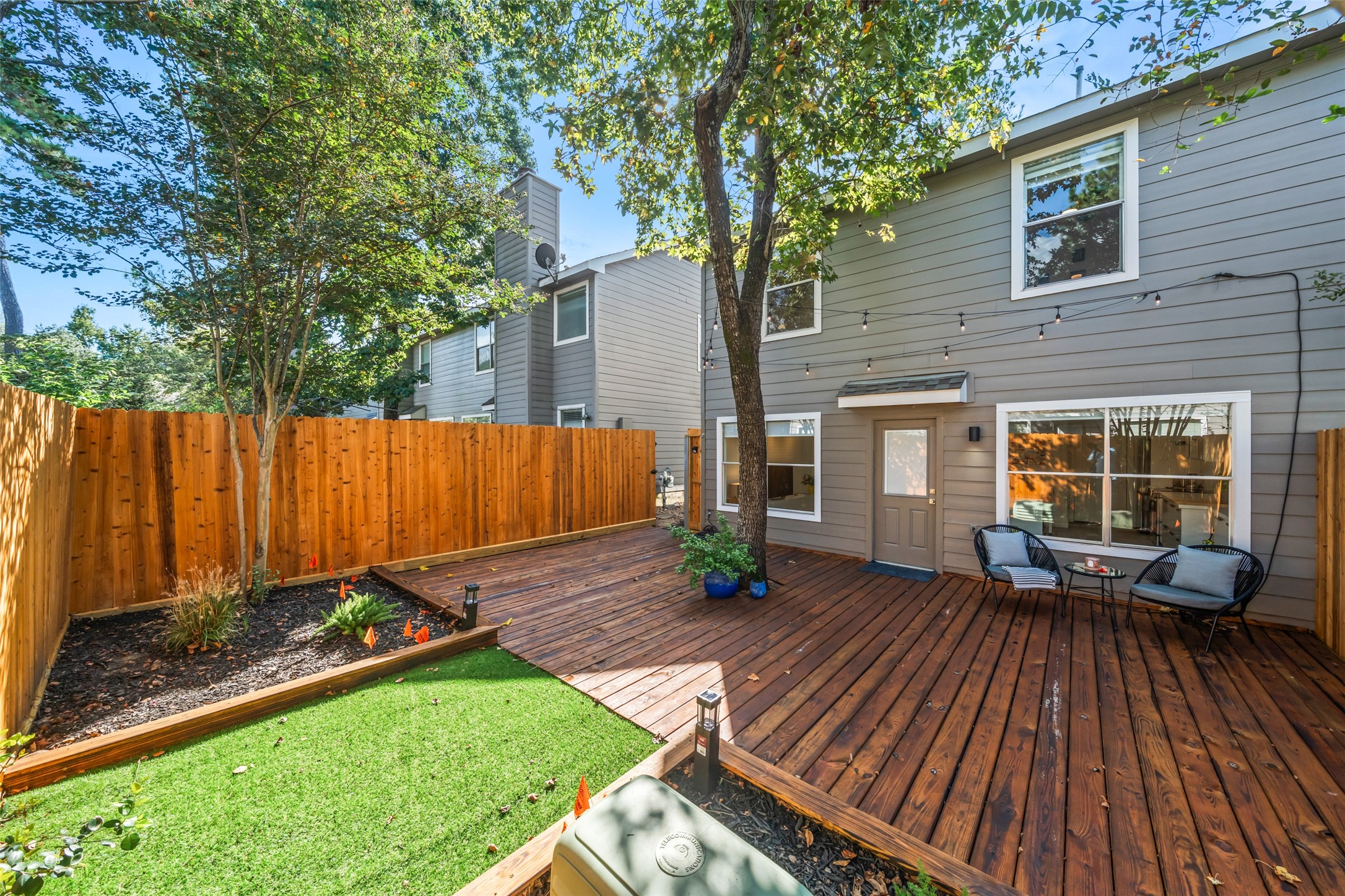 258 Sentry Maple Place The Woodlands, TX 77382 - Photo 14 of 27 a view of deck with patio