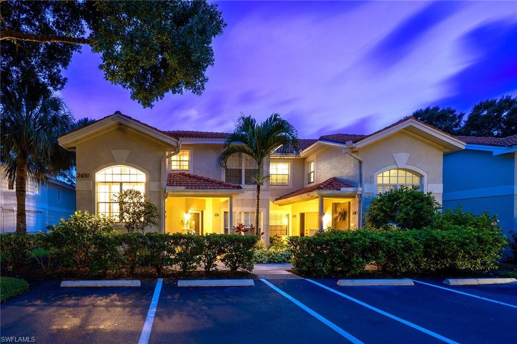 2450 Old Groves Road, Unit 201 Naples, FL 34109 - Photo 27 of 32 a house view with a garden space