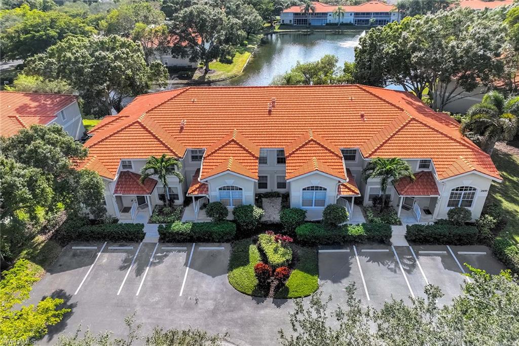 2450 Old Groves Road, Unit 201 Naples, FL 34109 - Photo 29 of 32 an aerial view of a house