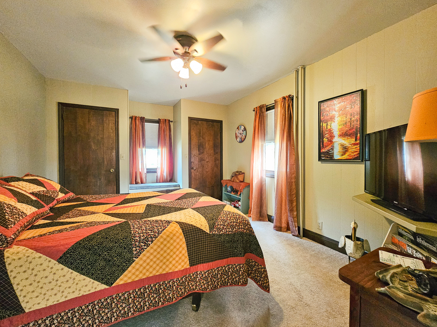 301 Adams Street Oregon, IL 61061 - Photo 11 of 50 a bedroom with a bed and wooden floor