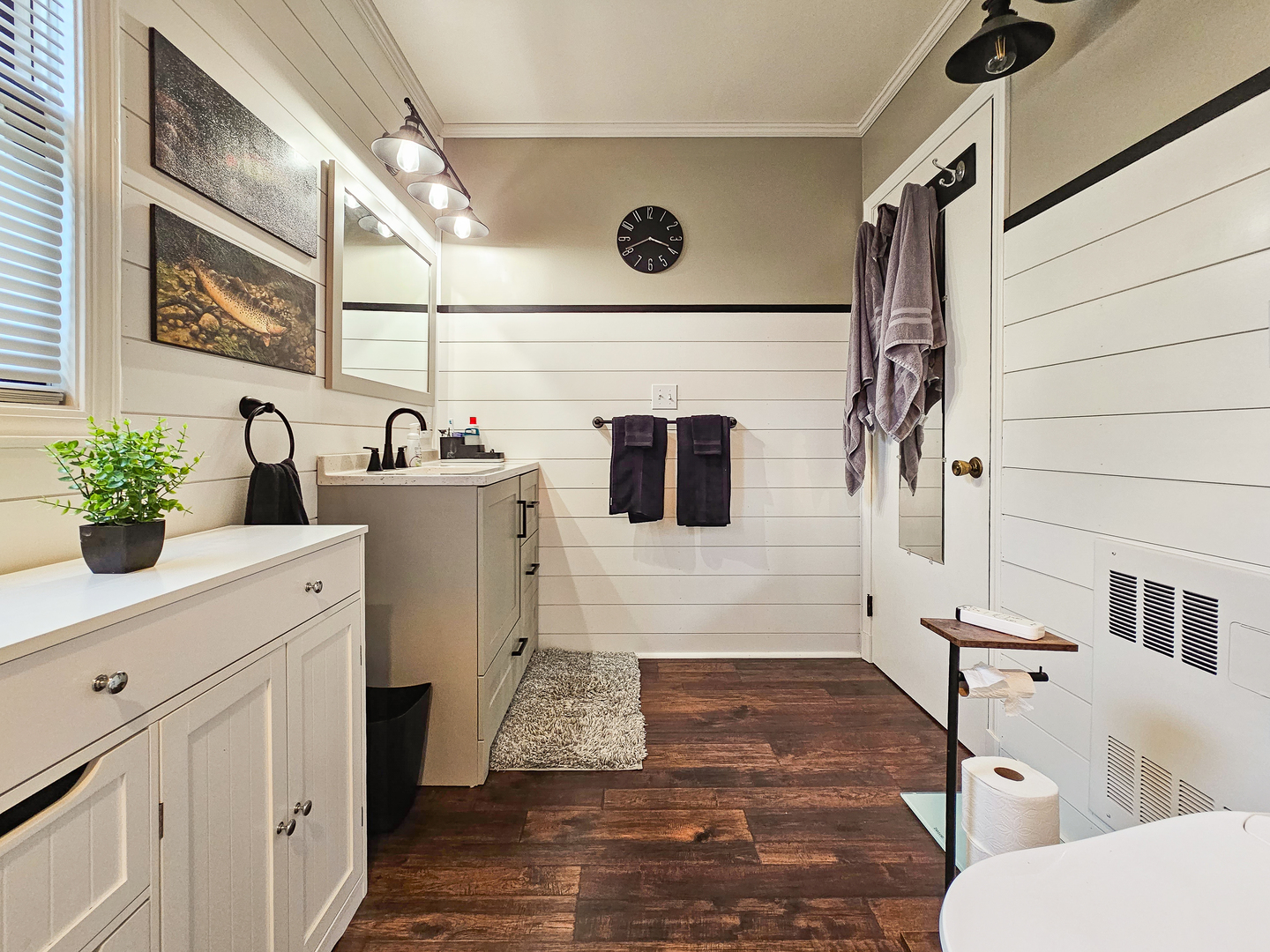 301 Adams Street Oregon, IL 61061 - Photo 17 of 50 a bathroom with a sink a mirror and shower