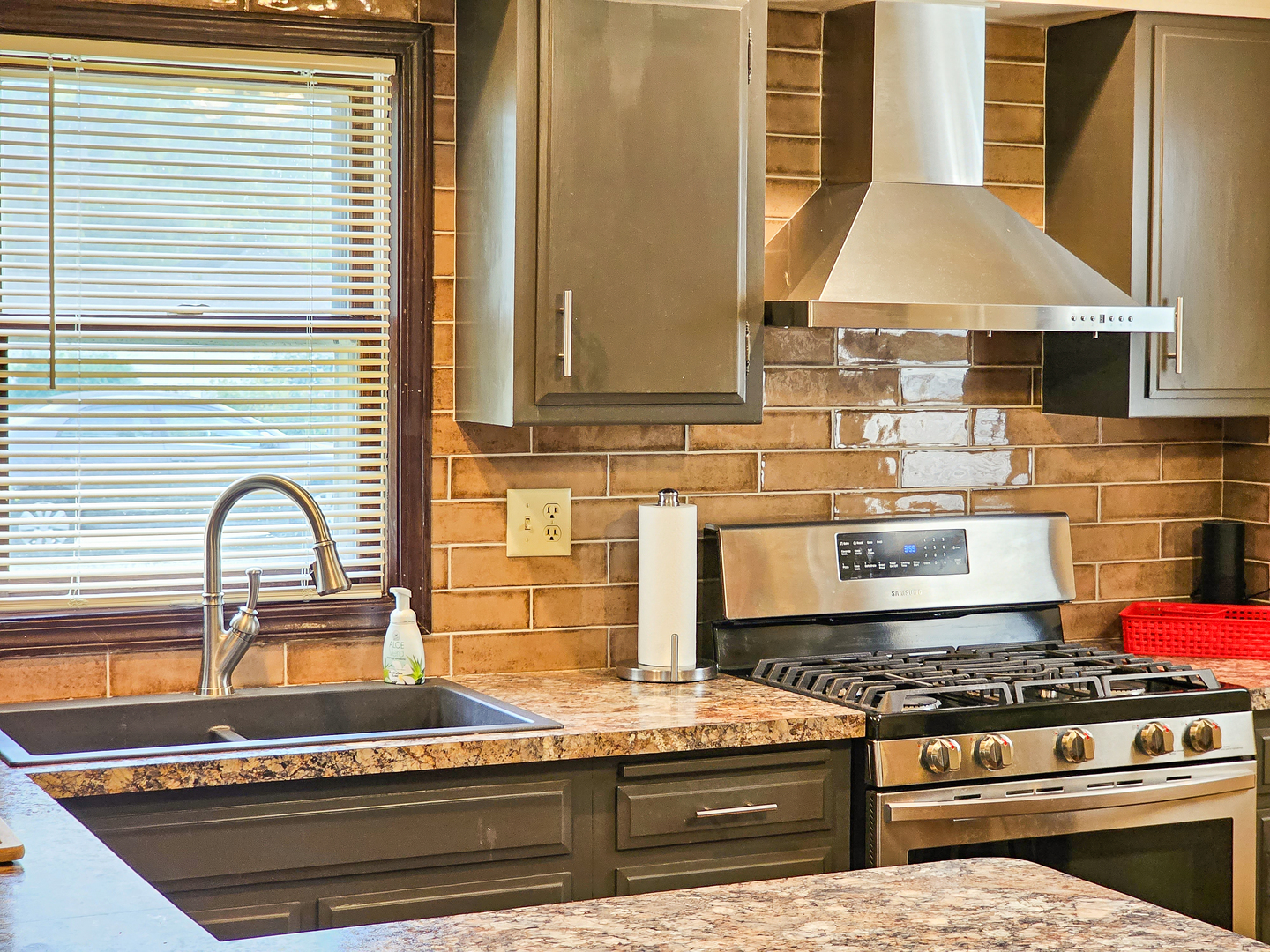 301 Adams Street Oregon, IL 61061 - Photo 25 of 50 a kitchen with stove and cabinets
