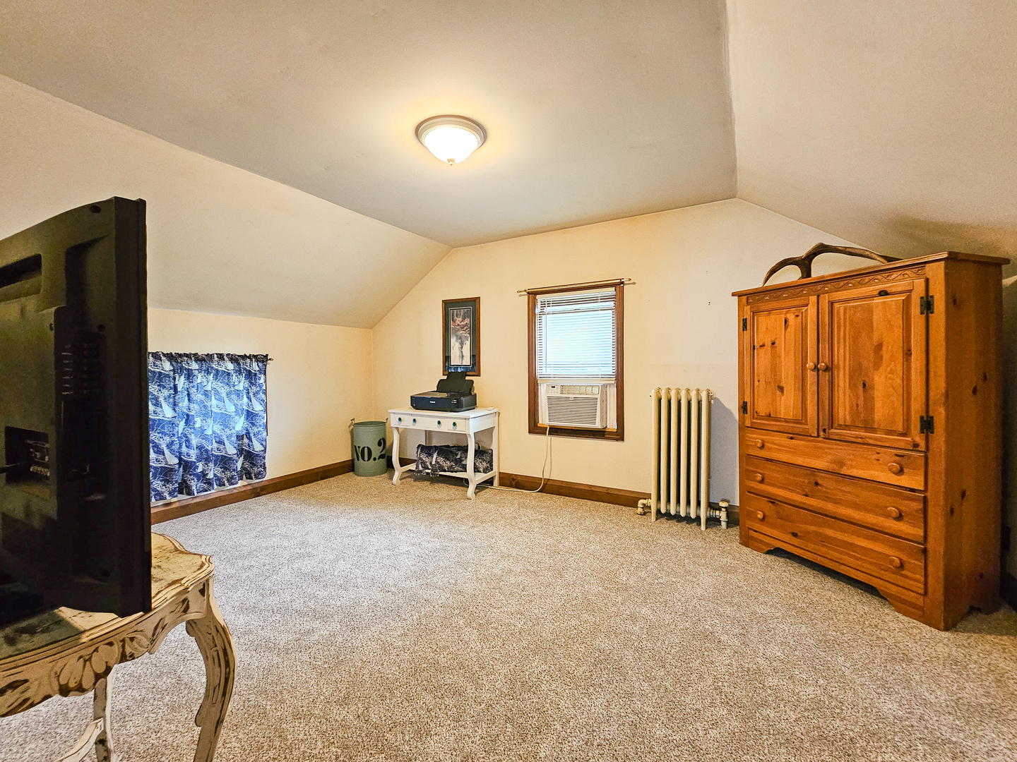 301 Adams Street Oregon, IL 61061 - Photo 30 of 50 a bedroom with furniture and a window