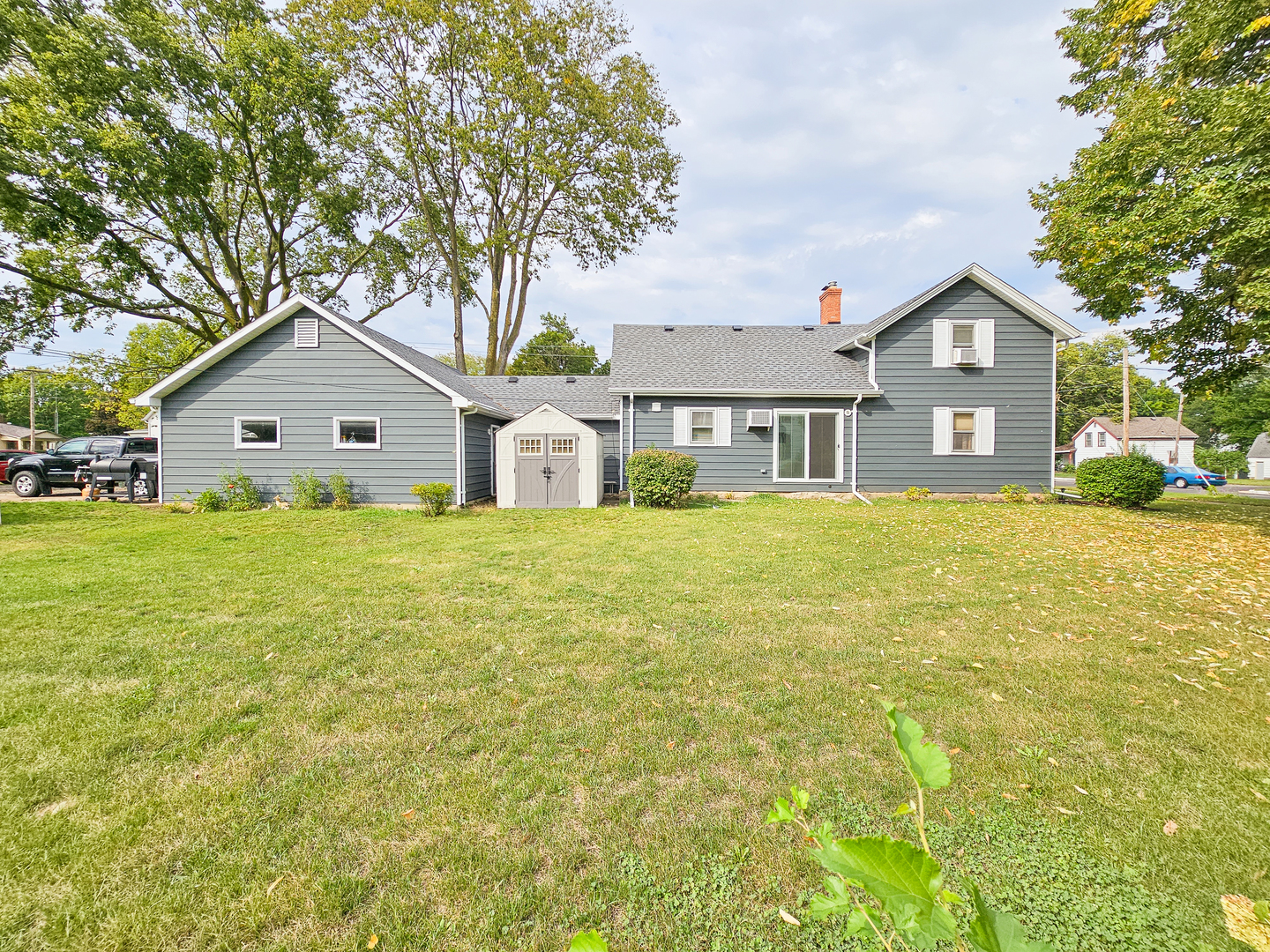 301 Adams Street Oregon, IL 61061 - Photo 40 of 50 a front view of a house with garden