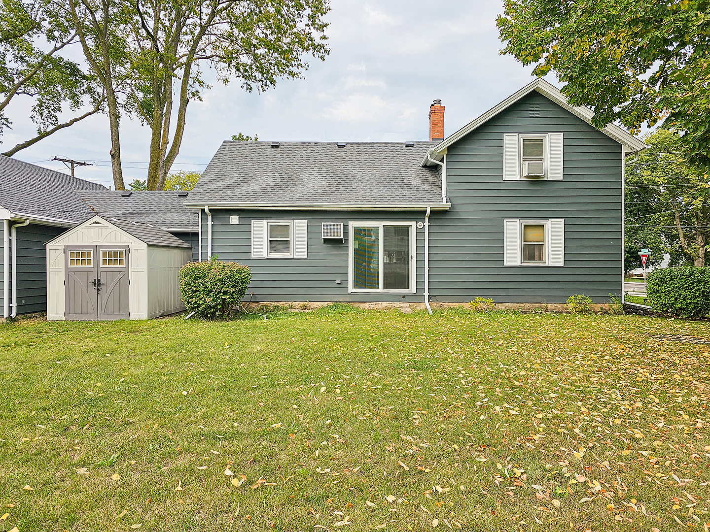 301 Adams Street Oregon, IL 61061 - Photo 42 of 50 a front view of a house with garden