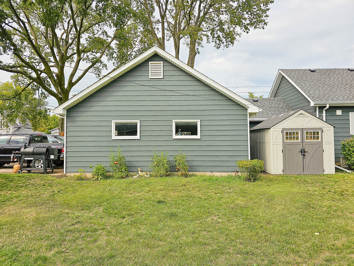 301 Adams Street Oregon, IL 61061 - Photo 44 of 50 a view of a house with a yard