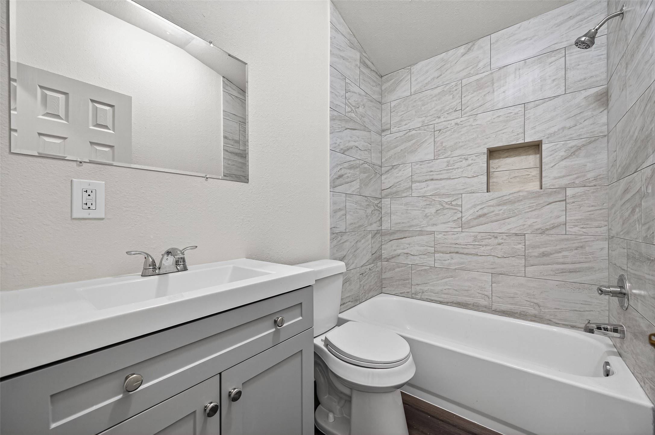 3322 Brackenfern Road Katy, TX 77449 - Photo 24 of 38 a bathroom with a sink a toilet and bathtub