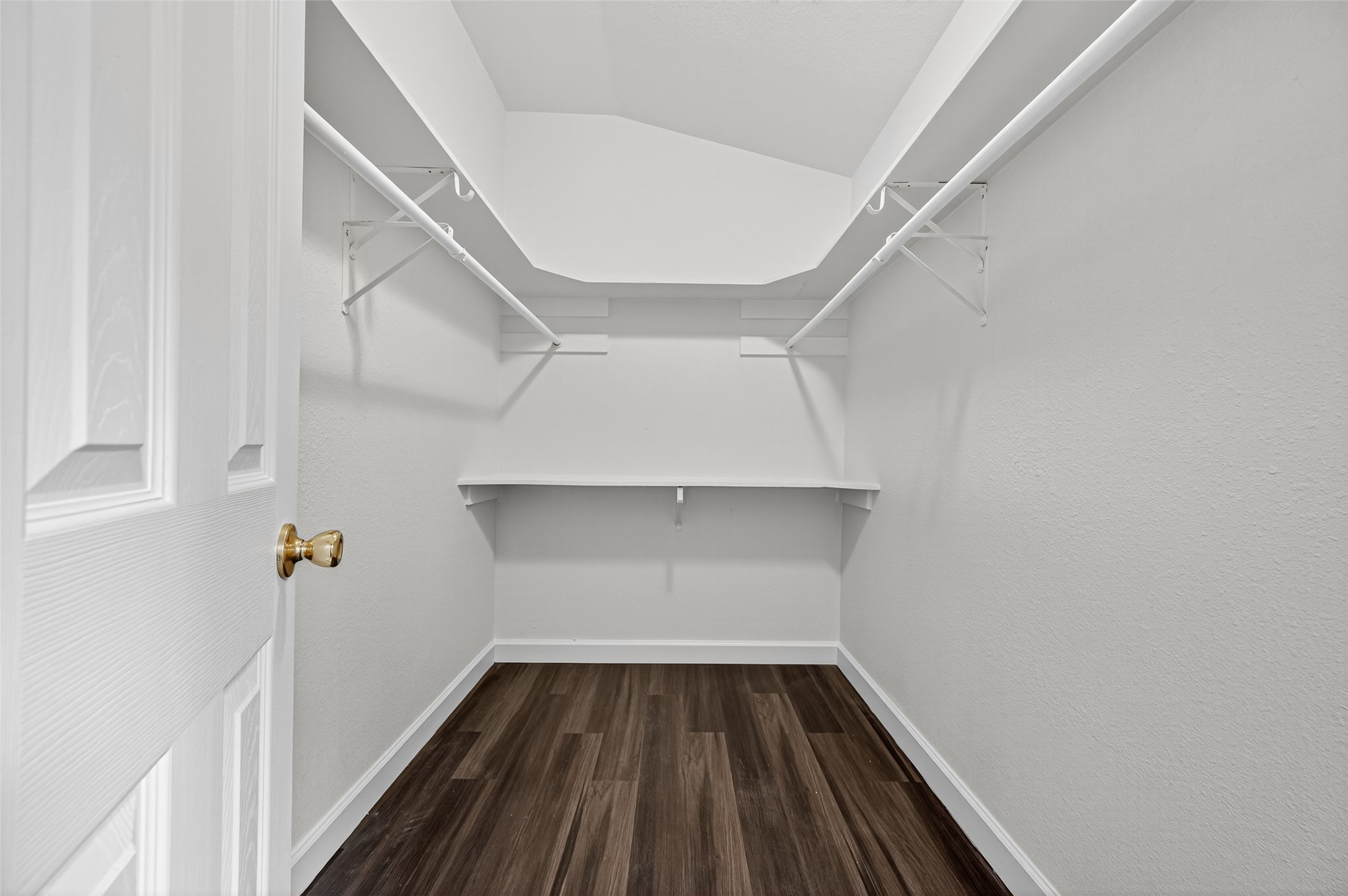 3322 Brackenfern Road Katy, TX 77449 - Photo 34 of 38 a view of storage and utility room with wooden floor