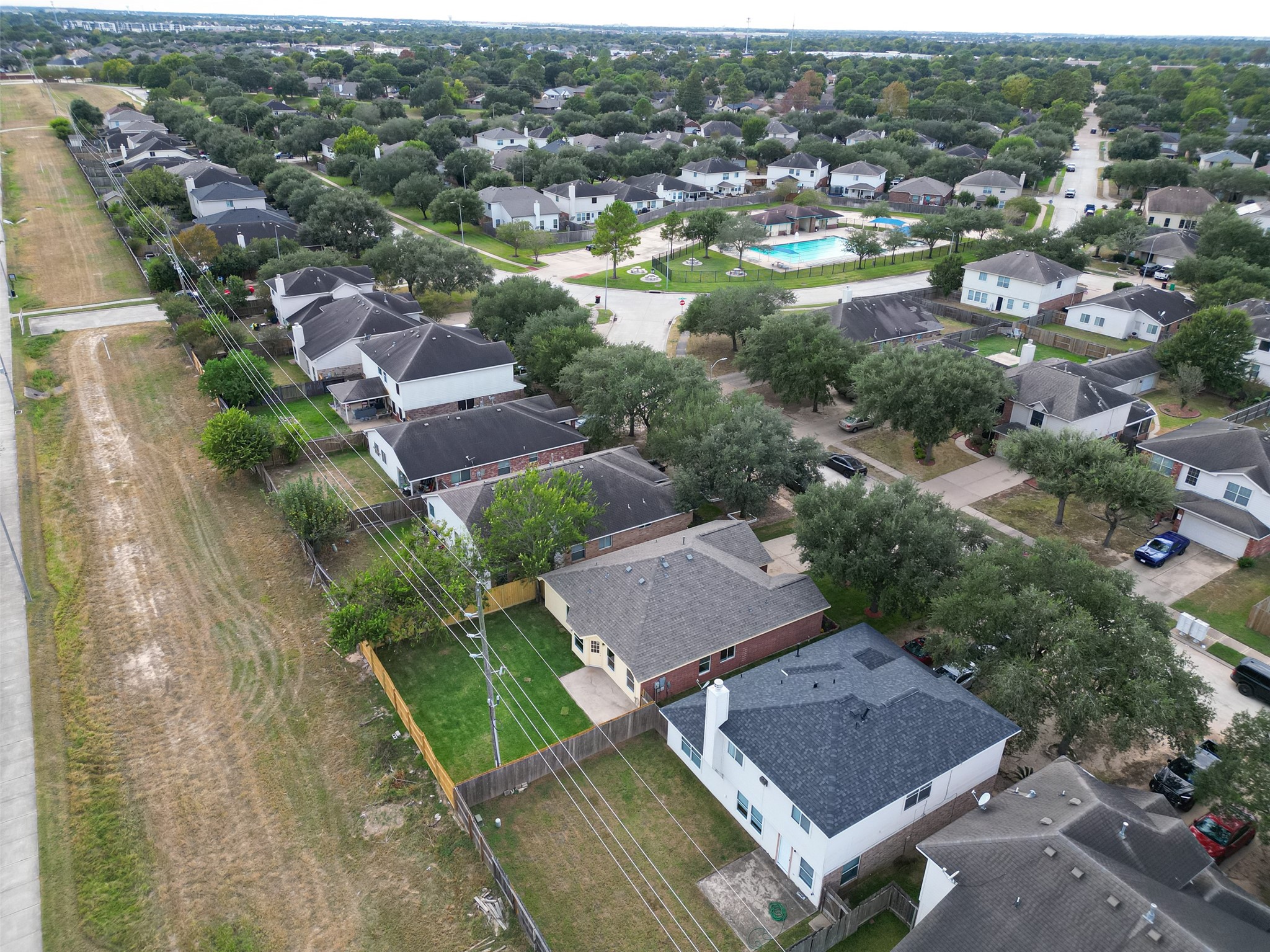 3322 Brackenfern Road Katy, TX 77449 - Photo 38 of 38 an aerial view of residential houses with outdoor space and river