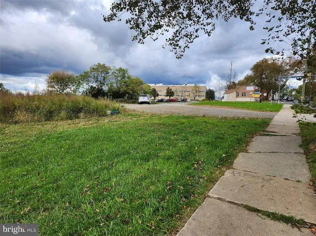 a view of a street with some trees