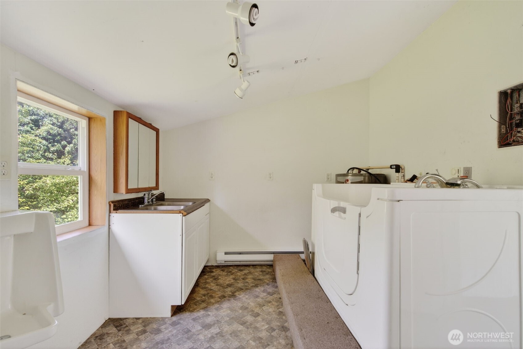 943 Fall Creek Road Longview, WA 98632 - Photo 15 of 40 a room with storage and utility