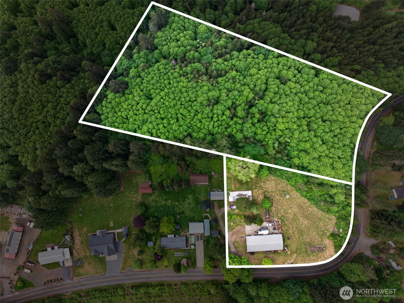 943 Fall Creek Road Longview, WA 98632 - Photo 2 of 40 a view of a yard in a balcony