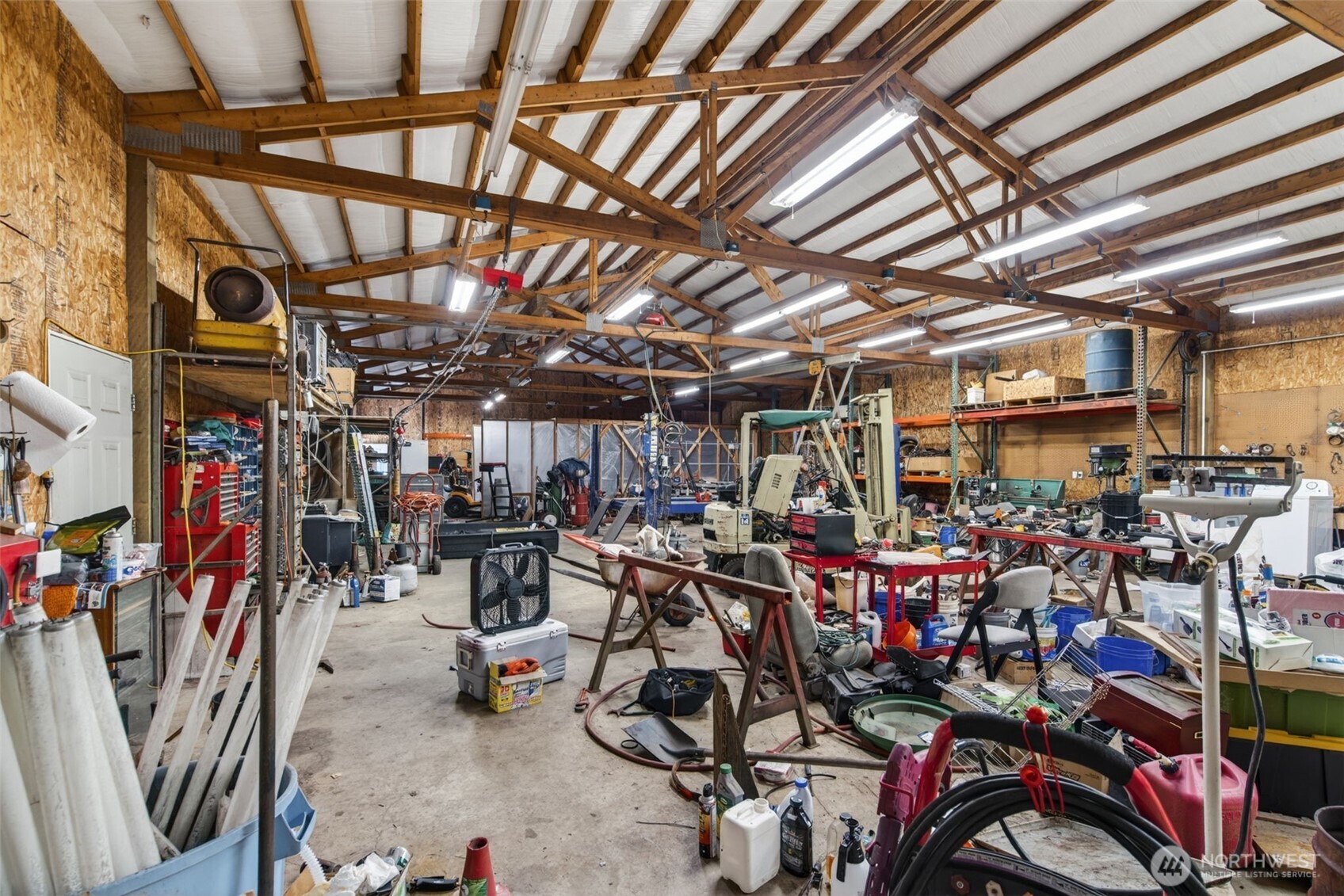 943 Fall Creek Road Longview, WA 98632 - Photo 23 of 40 a view of a storage room with racks