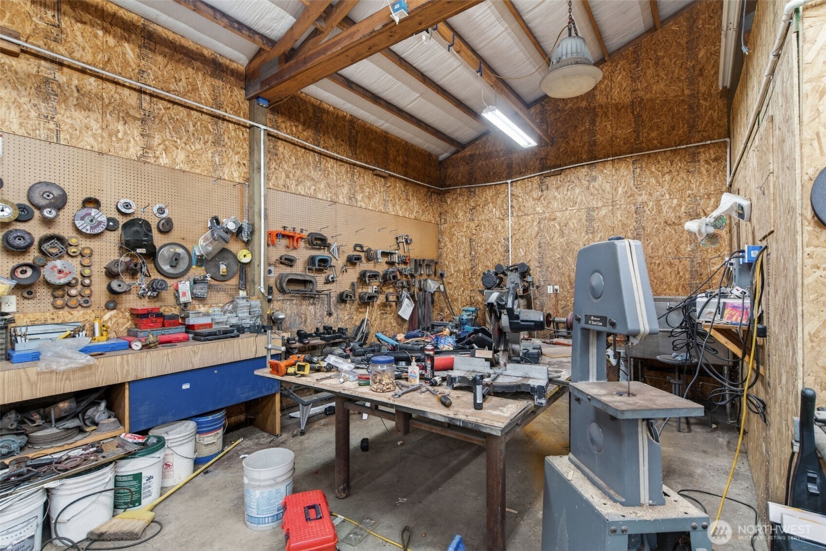 943 Fall Creek Road Longview, WA 98632 - Photo 24 of 40 a view of a storage room with a lot of stuff