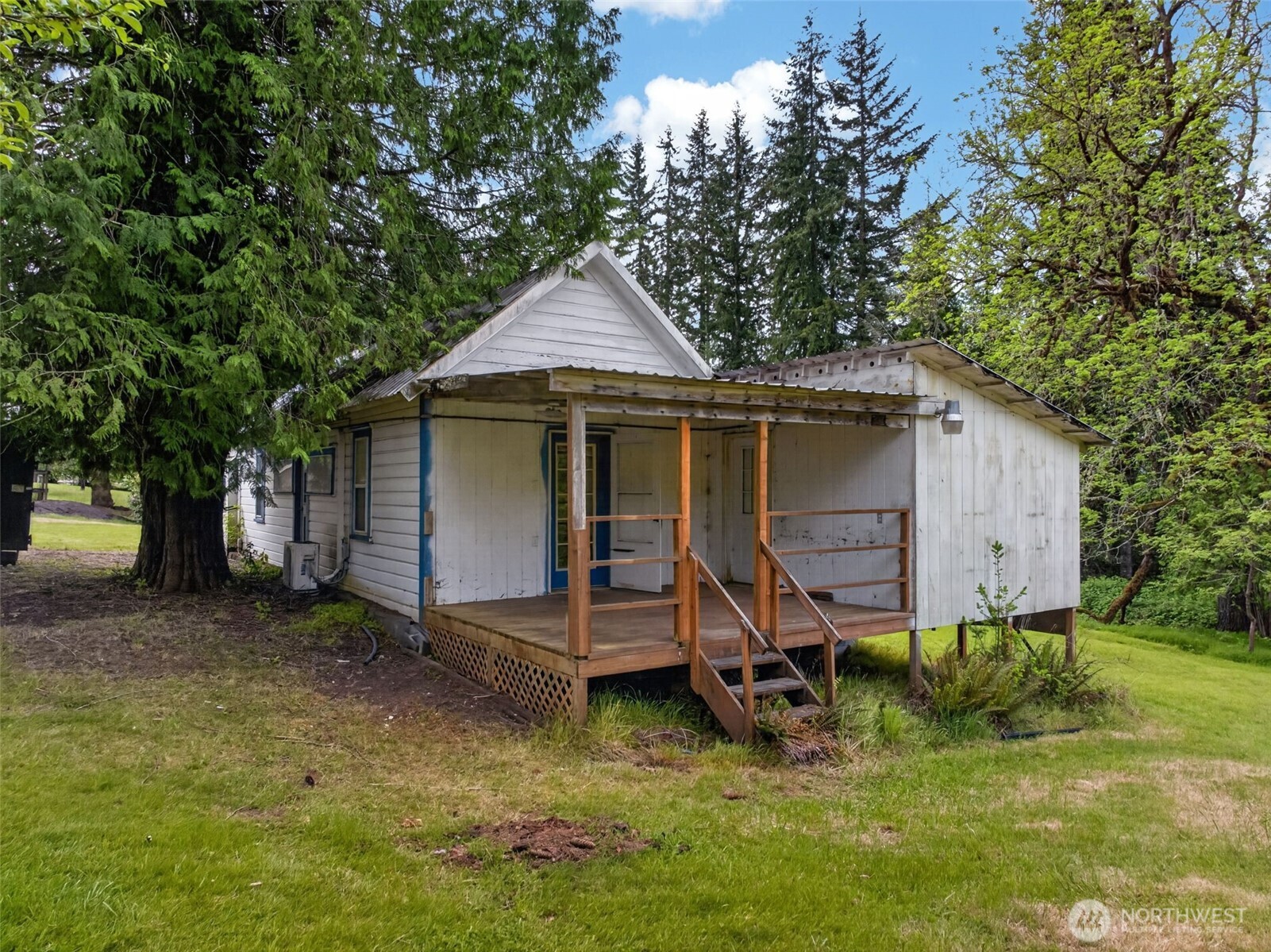 943 Fall Creek Road Longview, WA 98632 - Photo 6 of 40 a view of a house with a yard
