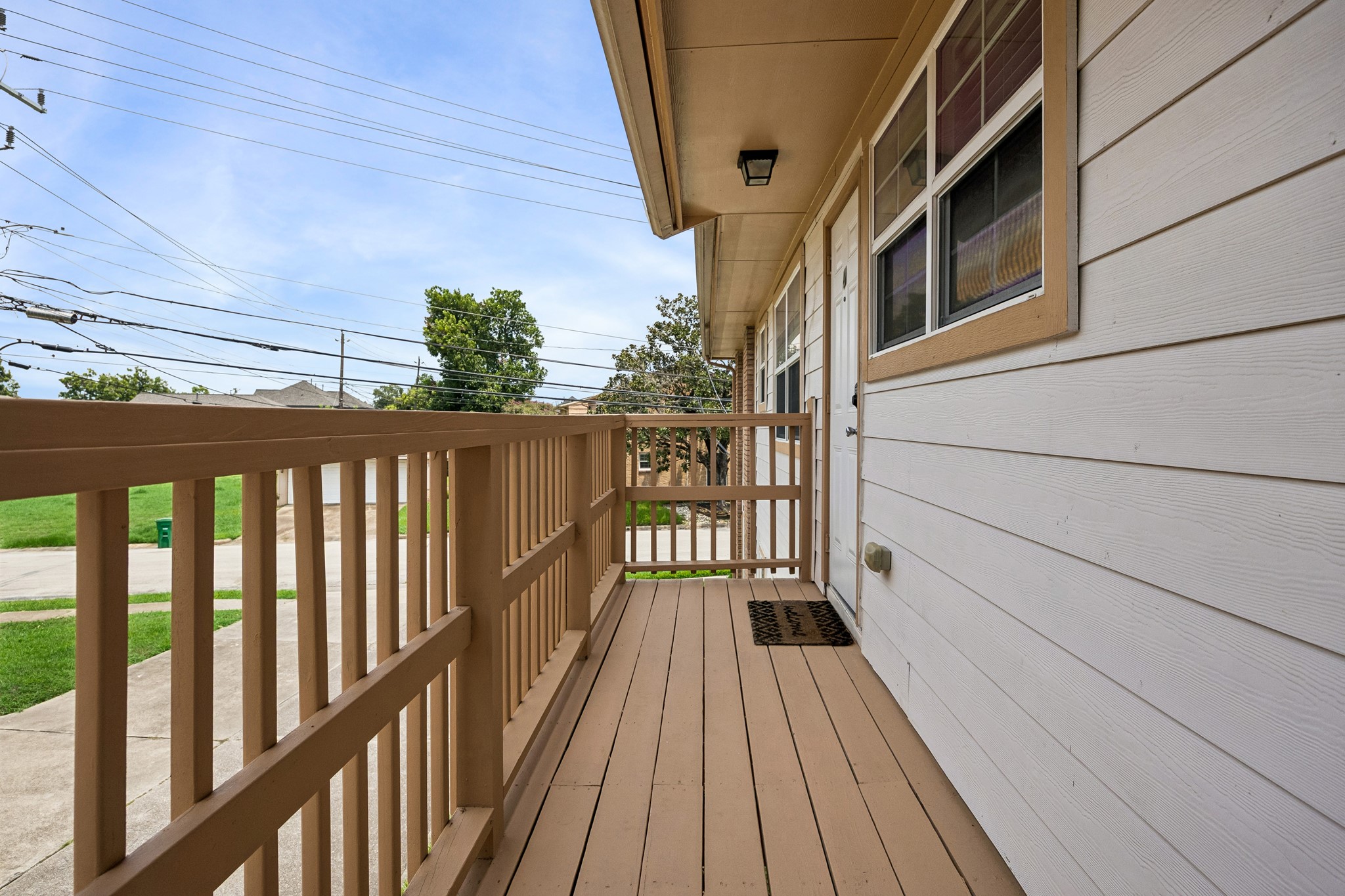 3237 Rosedale Street, Unit 4 Houston, TX 77004 - Photo 9 of 17 a view of a balcony with wooden floor