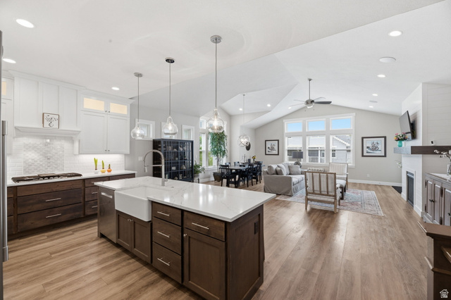2109 Sunflower Lane Mapleton, UT 84664 - Photo 15 of 43 Gourmet Kitchen w/Gas Cooktop, Double Wall Oven, Extra Large Built-in Refrigerator/Freezer, Extra Long Island w/Farm Style Sink! Oversized Walk-in Pantry!