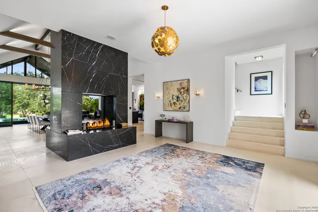 a view of a living room and hardwood floor