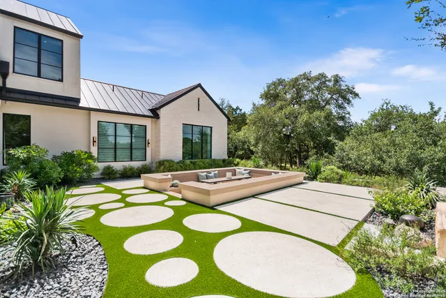 a view of a swimming pool with a patio