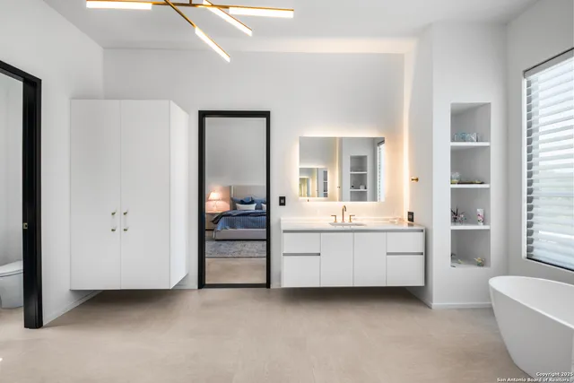 a room with furniture and a bathroom