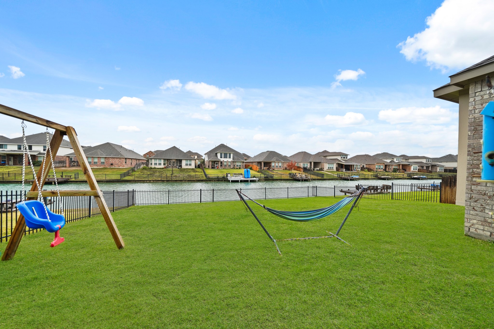 24031 Corinaldo Court Katy, TX 77493 - Photo 22 of 23 a view of a lake with a park