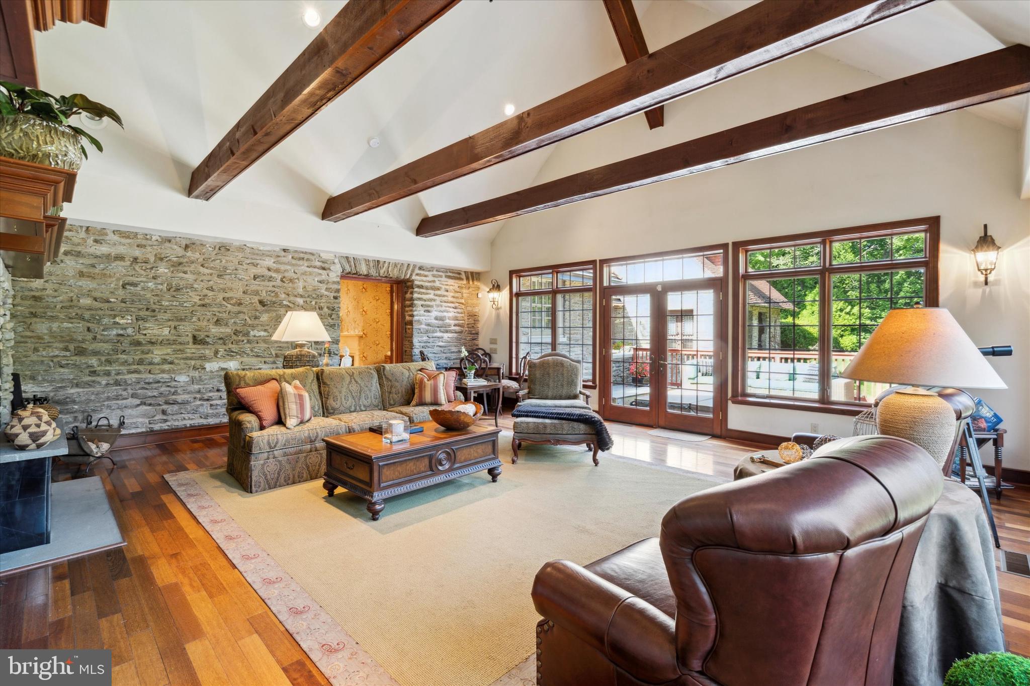 1264 Mill Road Rydal, PA 19046 - Photo 21 of 127 Sliders lead out to private rear deck and hot tub