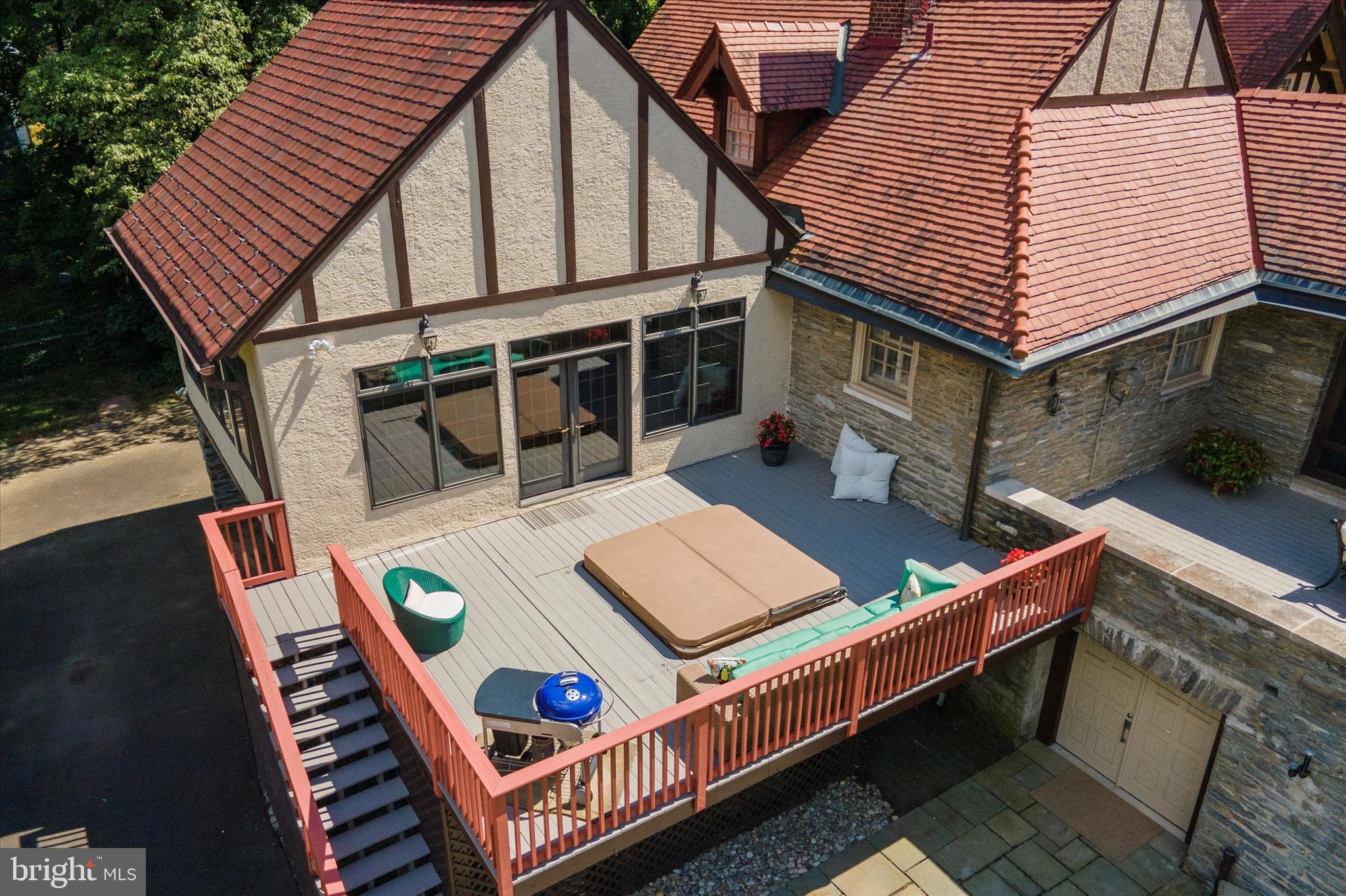 1264 Mill Road Rydal, PA 19046 - Photo 89 of 127 Family room leads to expansive deck with hot tub