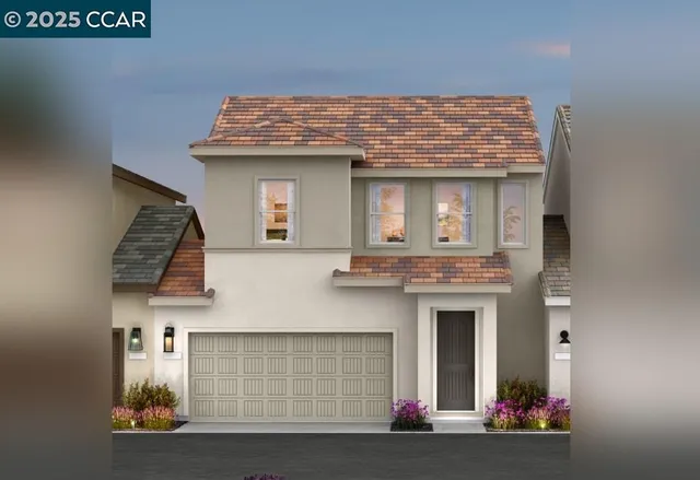 a front view of a house with garage