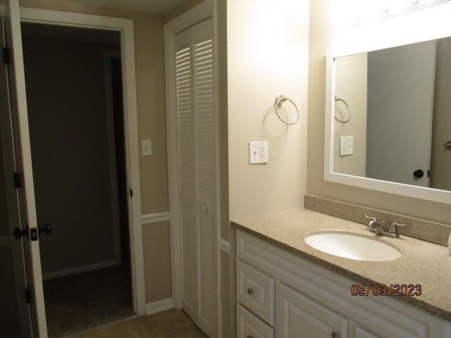 411 Crisswell Road Butler, PA 16002 - Photo 8 of 9 a bathroom with a granite countertop sink and a mirror