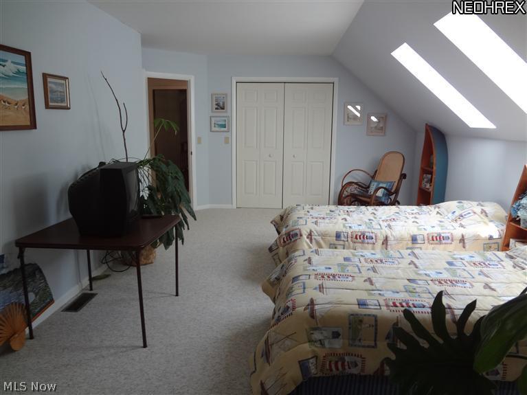 7680 Valley View Road Hudson, OH 44236 - Photo 18 of 25 Bedroom 4 has skylights and a walk-in closet and is bright and inviting.