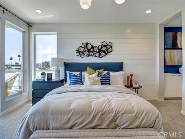 706 Obsidian Loop East Palm Springs, CA 92264 - Photo 30 of 49 a bedroom with a bed and a television