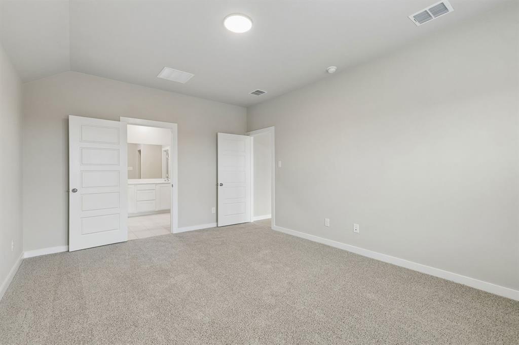 1124 Del Rio Drive Lavon, TX 75166 - Photo 17 of 32 Primary Suite in the Emmy II home plan by Trophy Signature Homes - REPRESENTATIVE PHOTO
