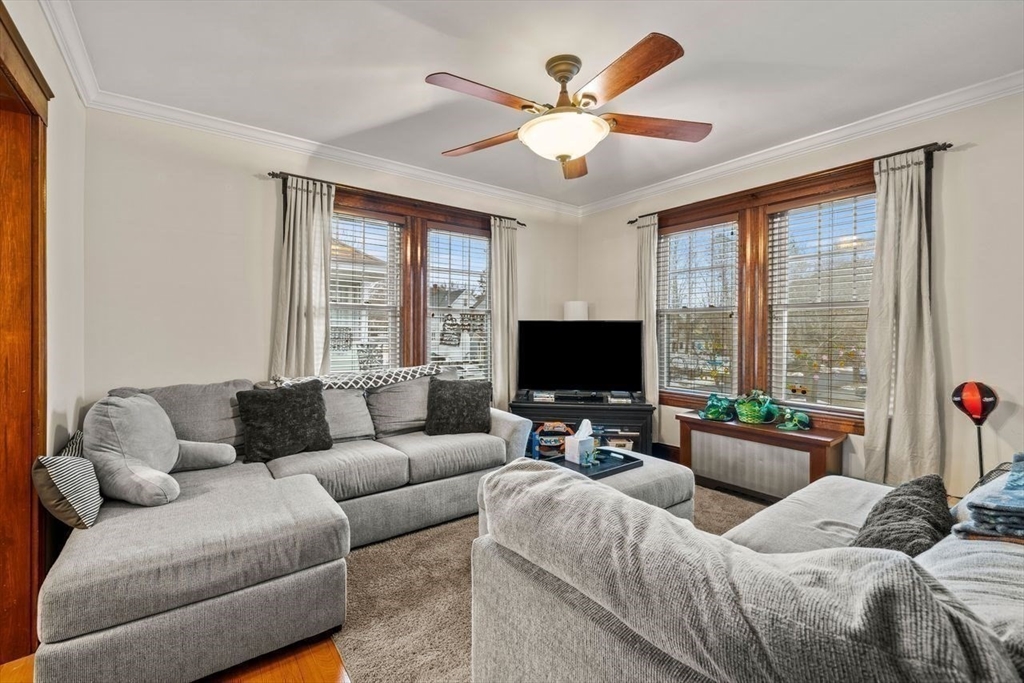 86-88 Maple Avenue North Andover, MA 01845 - Photo 26 of 41 a living room with furniture and a flat screen tv