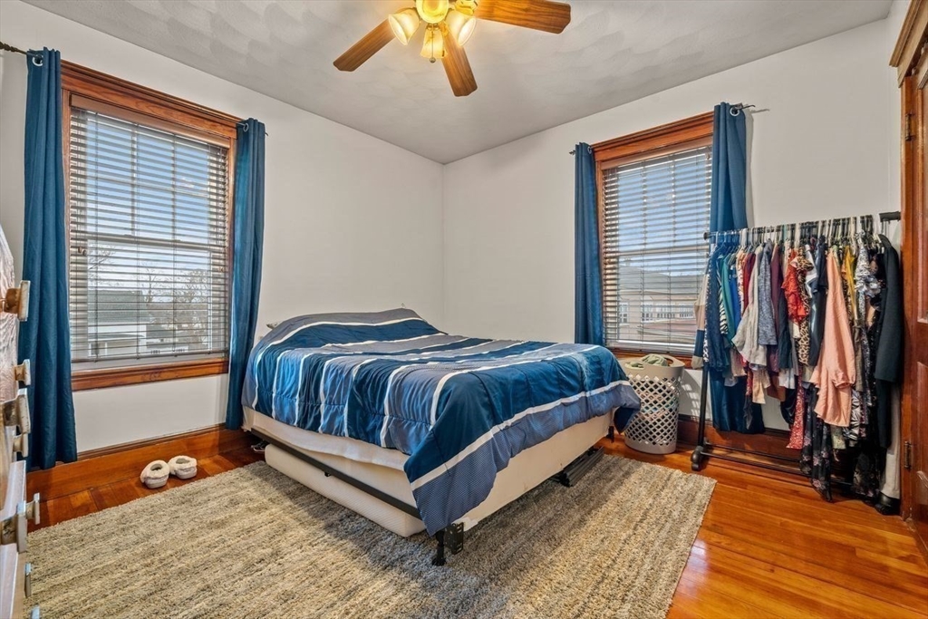 86-88 Maple Avenue North Andover, MA 01845 - Photo 27 of 41 a bedroom with a bed and a window
