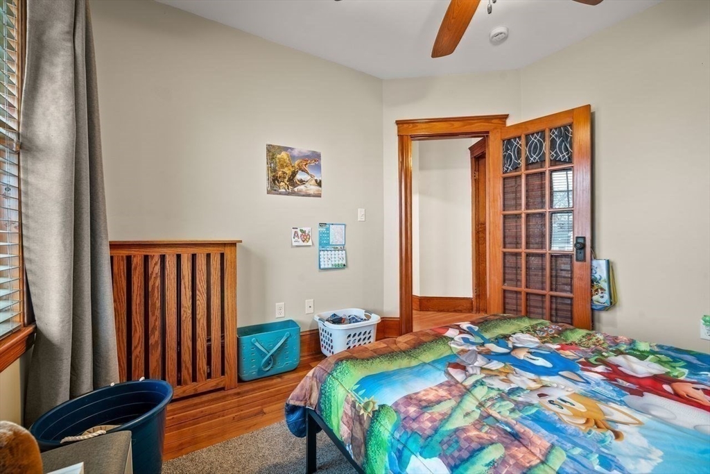 86-88 Maple Avenue North Andover, MA 01845 - Photo 30 of 41 a bedroom with a bed and a window