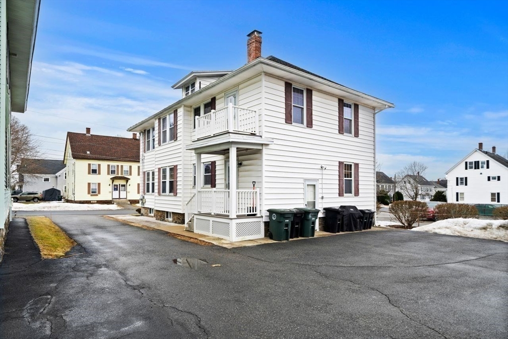 86-88 Maple Avenue North Andover, MA 01845 - Photo 5 of 41 a view of a house with a lounge chair