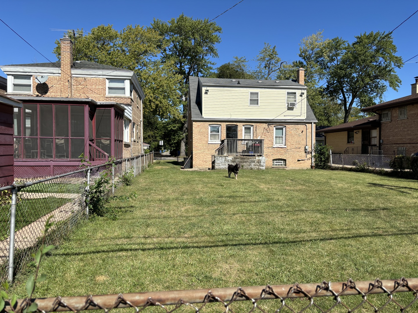 545 East 86th Street Chicago, IL 60619 - Photo 21 of 22 a view of a house with a yard