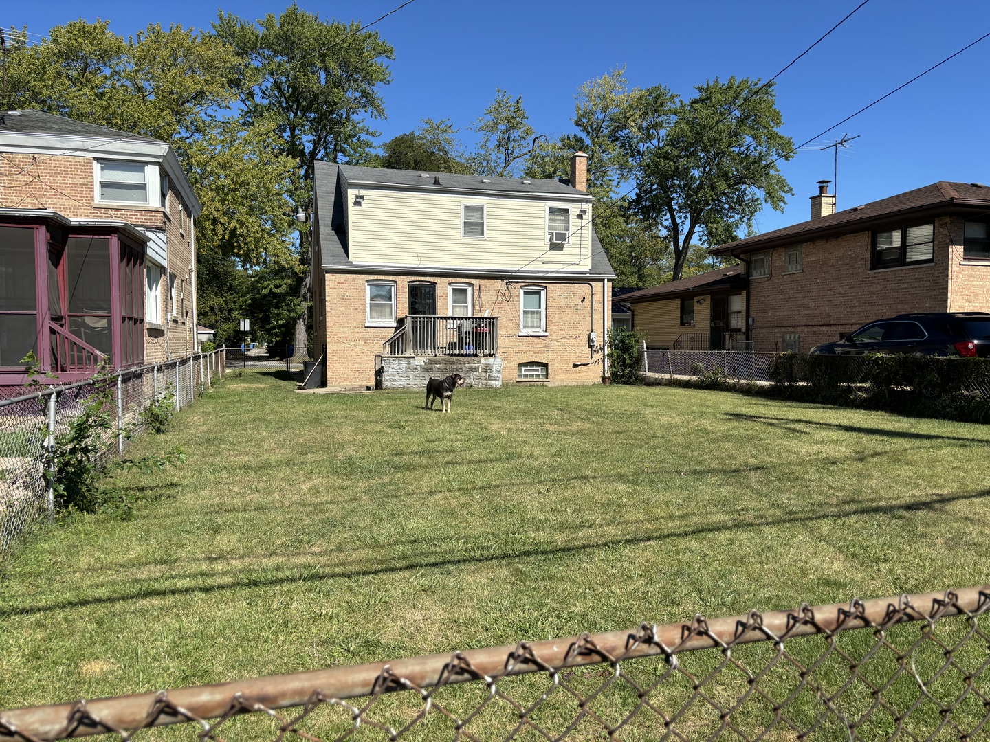 545 East 86th Street Chicago, IL 60619 - Photo 22 of 22 a view of a house with a yard