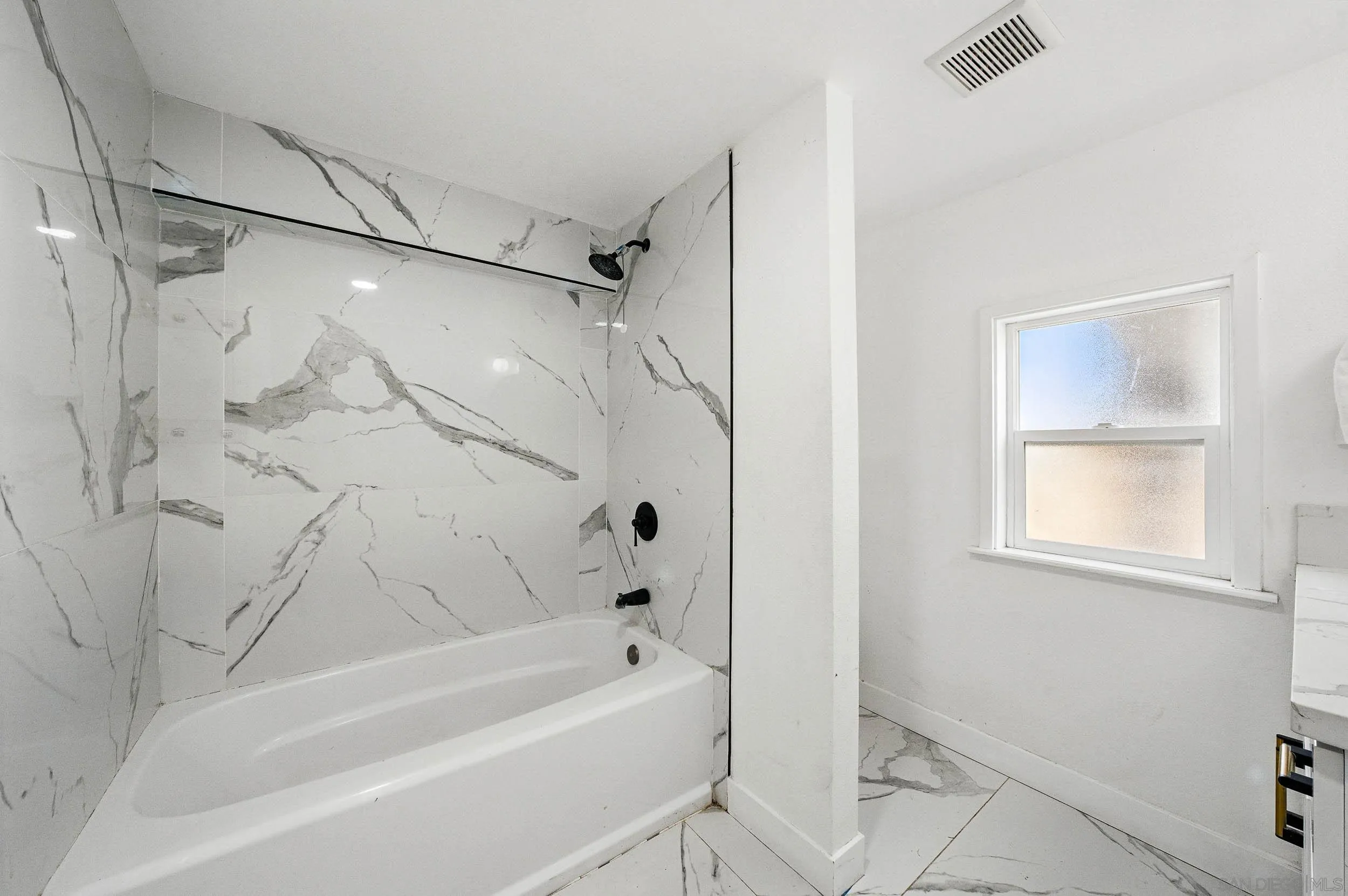 12049 Coping Place Lakeside, CA 92040 - Photo 14 of 36 a bathroom with a tub shower vanity and a sink