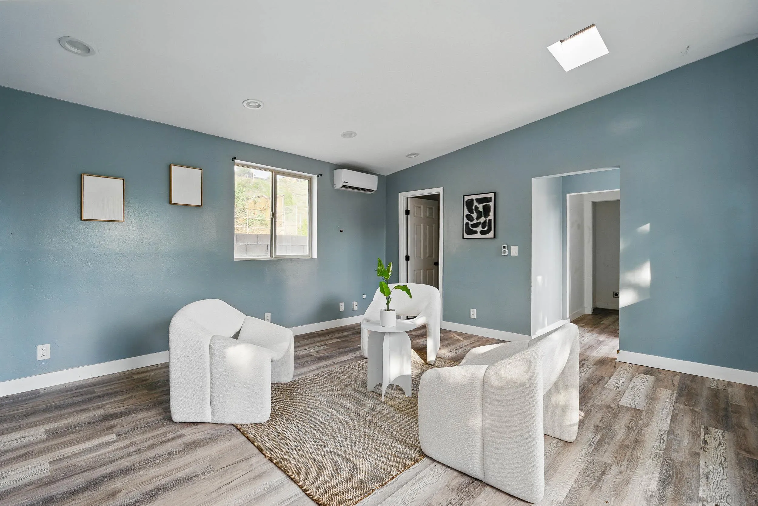 12049 Coping Place Lakeside, CA 92040 - Photo 24 of 36 a living room with couches and painting on the wall