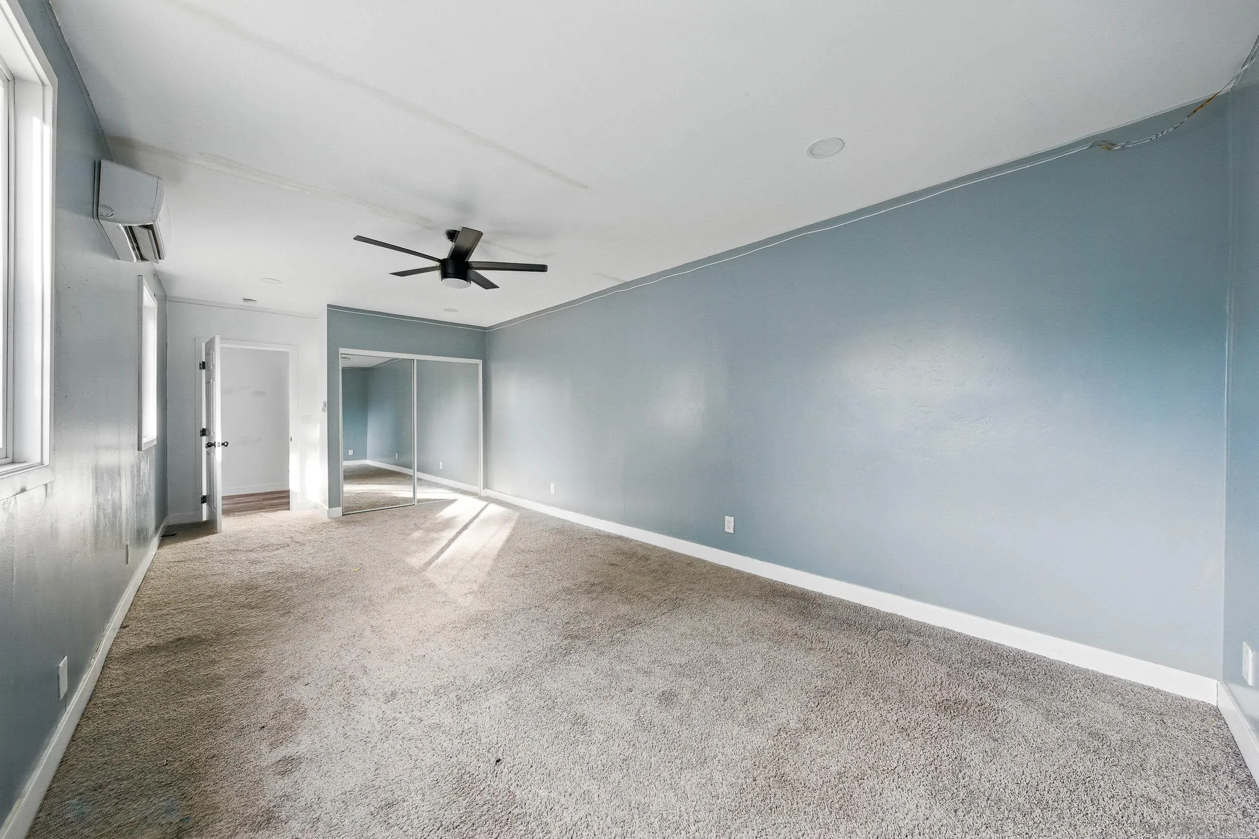 12049 Coping Place Lakeside, CA 92040 - Photo 26 of 36 a view of a livingroom with a ceiling fan and window