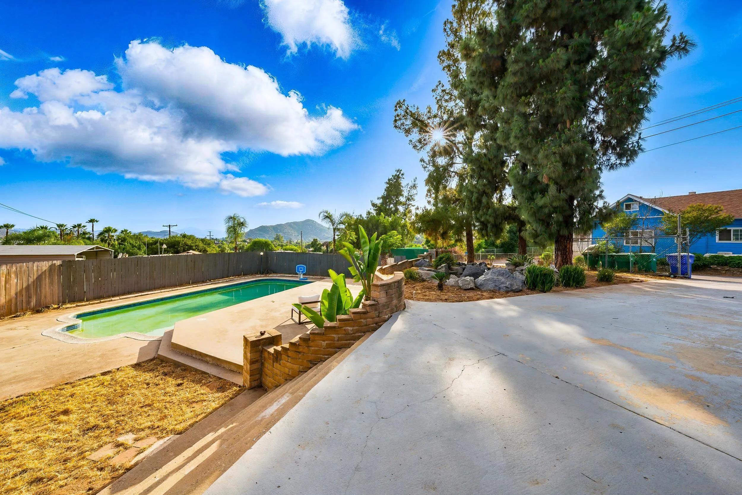 12049 Coping Place Lakeside, CA 92040 - Photo 30 of 36 a view of swimming pool with a yard