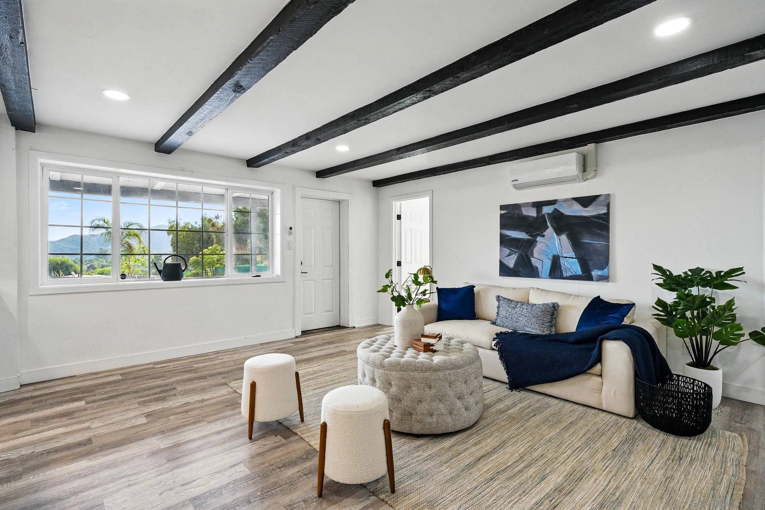 12049 Coping Place Lakeside, CA 92040 - Photo 6 of 36 a living room with furniture and a potted plant