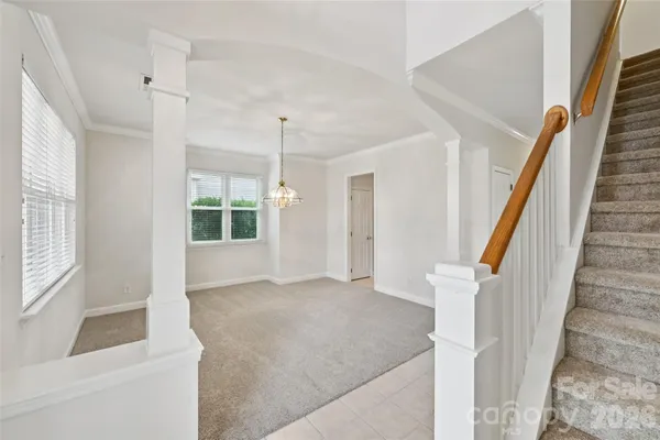 a view of an entryway with staircase