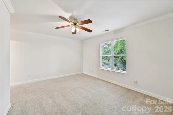 a view of livingroom with furniture window and front door